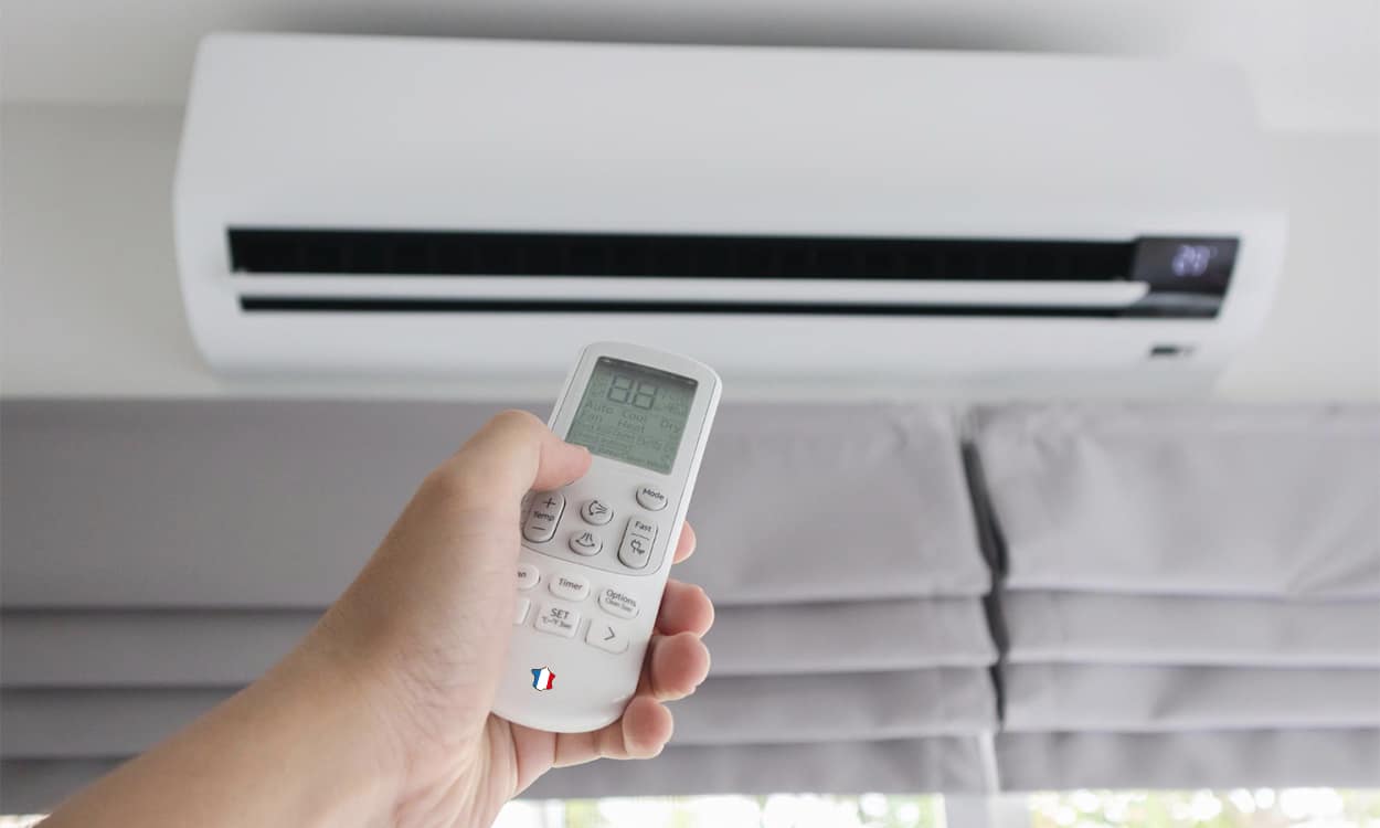 Télécommande qui règle la température d'une climatisation réversible